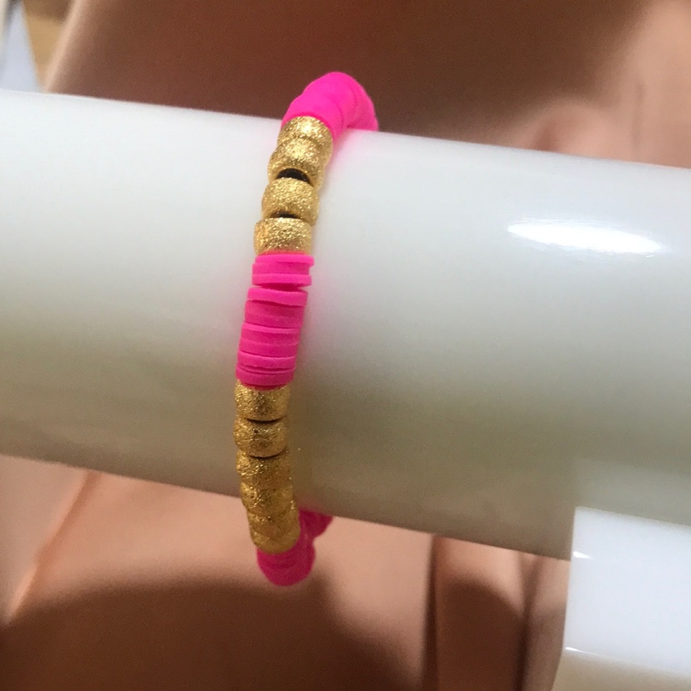 Mayamar stretch pink and gold bracelet. Sold in high end boutiques. Hand made.